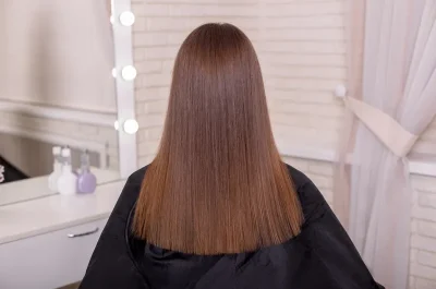 Smooth, shiny brunette hair after a keratin smoothing treatment in Billerica